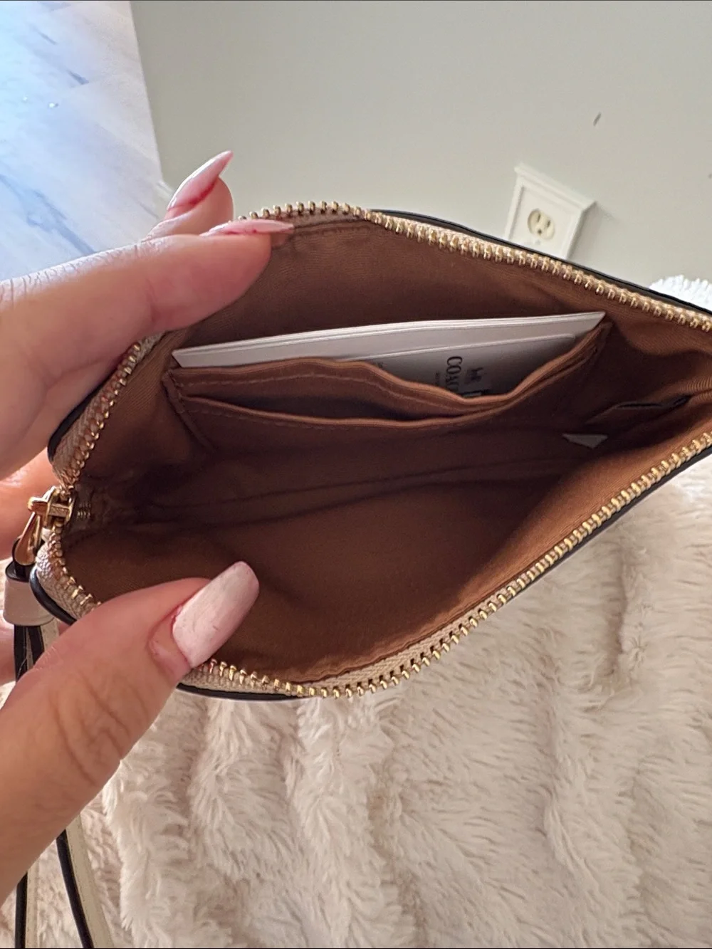 Coach Beige Signature Canvas Wristlet with Cream Center Panel